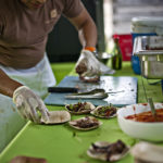 Chef Bruce plating out ribs at the 2011 Yew Dell Sculpture Show